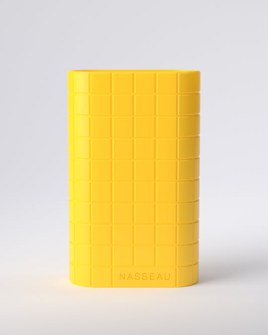 Yellow 3d printed oval vase with 'Nasseau' branding on a light gray background