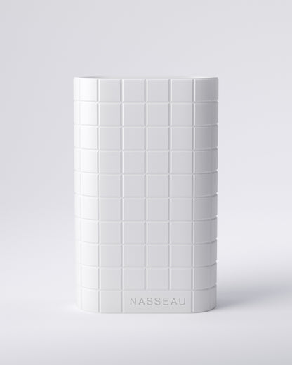 White 3d printed oval vase with 'Nasseau' branding on a light gray background