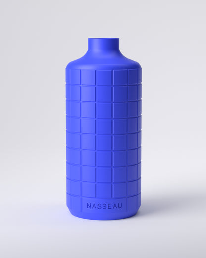 Blue 3d printed round vase with 'Nasseau' branding on a light gray background