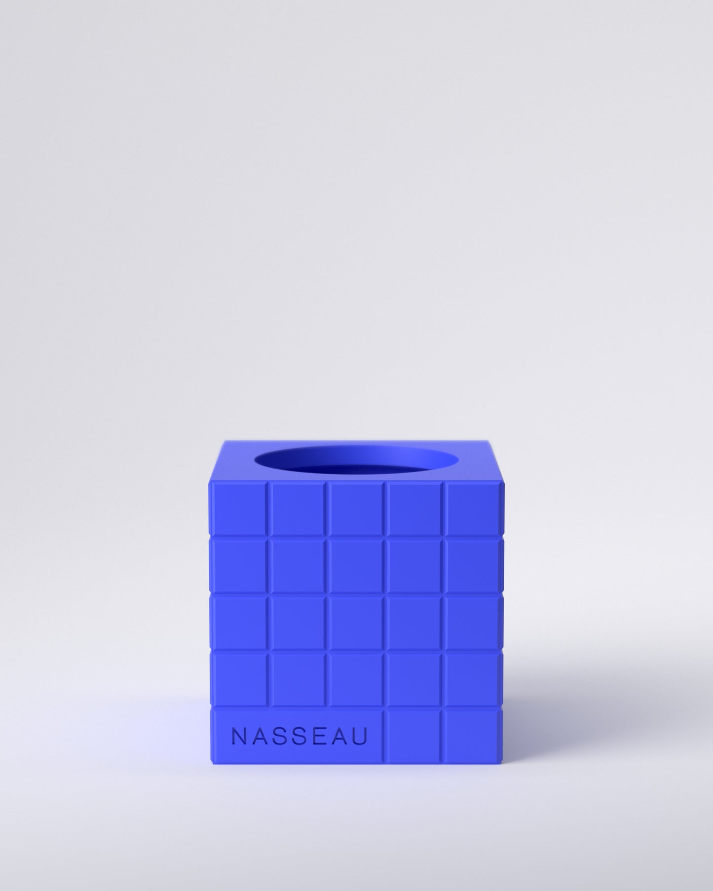 Blue 3d printed square vase with 'Nasseau' branding on a light gray background
