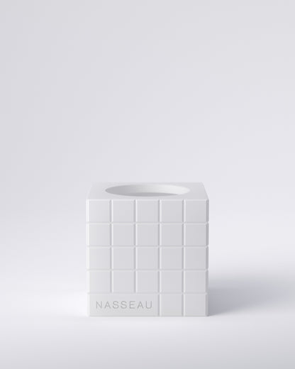 White 3d printed square vase with 'Nasseau' branding on a light gray background