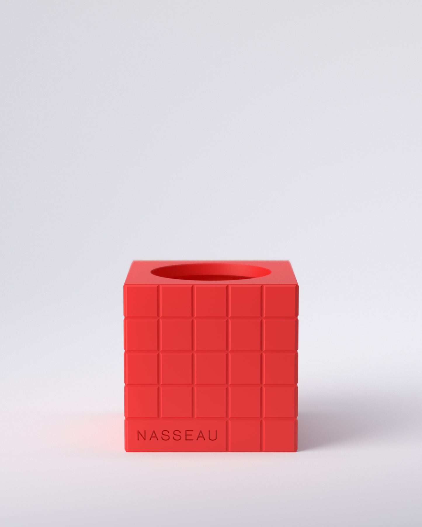 Red 3d printed square vase with 'Nasseau' branding on a light gray background