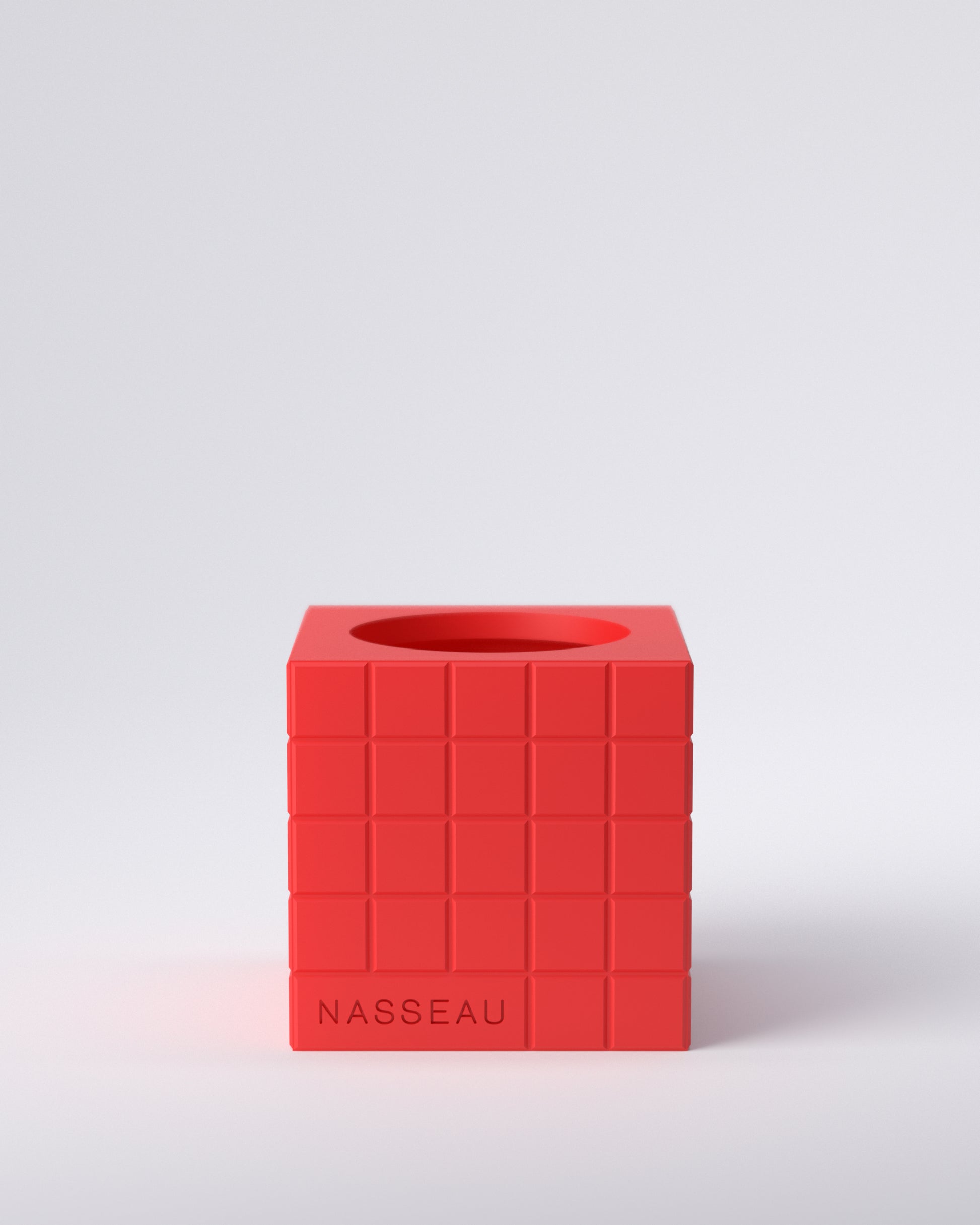 Red 3d printed square vase with 'Nasseau' branding on a light gray background